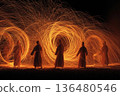 Fire Dances Illuminate the Night Sky in a Captivating Bulgarian Tradition Generative AI 136480546