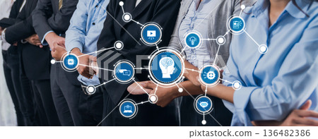 Business Professionals Engaged in Discussion with Technology and AI Integration, Showcasing Future Innovations and Collaborative Ideas. Amity Business Professionals Engaged in Discussion with Technology and AI Integration, Showcasing Future Innovations and Collaborative Ideas. Amity 136482386