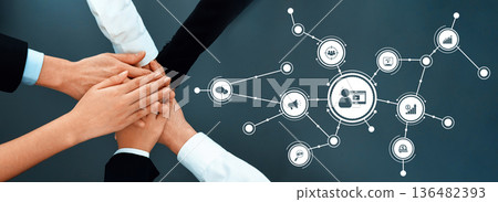 Diverse Hands Collaborating in a Digital Marketing Strategy with Iconic Symbols Illustrating Teamwork, Growth, and Communication. Amity 136482393