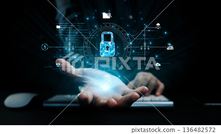 Man hand holds digital padlock hologram representing secure data protection and cybersecurity technology in modern digital environment for stock photo. Qubit 136482572