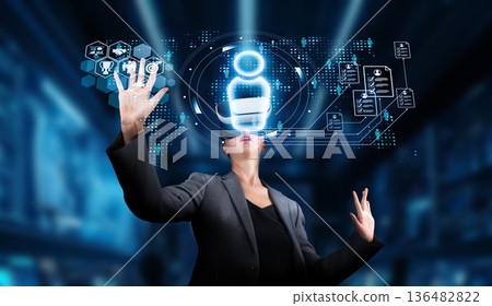 Professional woman interacting with digital interfaces for recruitment, job applications, and talent management in a modern workplace environment. XDMCP Professional woman interacting with digital interfaces for recruitment, job applications, and talent management in a modern workplace environment. XDMCP 136482822