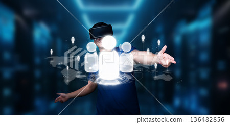 Person Engaging in Virtual Networking with Digital Icons in a Futuristic Office Environment Enhanced by Technology and Cyberspace Concepts XDMCP Person Engaging in Virtual Networking with Digital Icons in a Futuristic Office Environment Enhanced by Technology and Cyberspace Concepts XDMCP 136482856