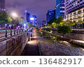 A beautiful urban night view of Cheonggyecheon Stream flowing through the center of Seoul, South Korea 136482917