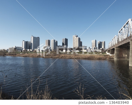 Winter urban scenery overlooking the Tamagawa River railway bridge and the tower apartment complexes of Kawasaki and Musashi-Kosugi Winter urban scenery overlooking the Tamagawa River railway bridge and the tower apartment complexes of Kawasaki and Musashi-Kosugi 136483940