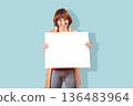 Smiling woman holding blank white sign board 136483964