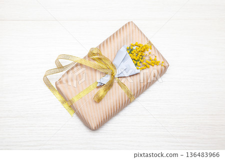 Small Gift with Mimosa Flowers 136483966