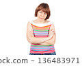 A frustrated young woman folded her arms across her chest 136483971