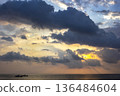 The sky is at dawn. The sky over the Indian Ocean at dawn. 136484604