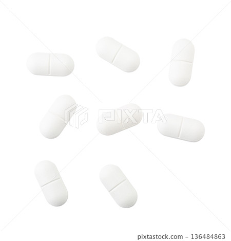 White pills isolated on a white backgroun White pills isolated on a white backgroun 136484863