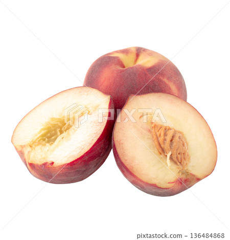 Half and slice peaches isolated on white background. Half and slice peaches isolated on white background. 136484868