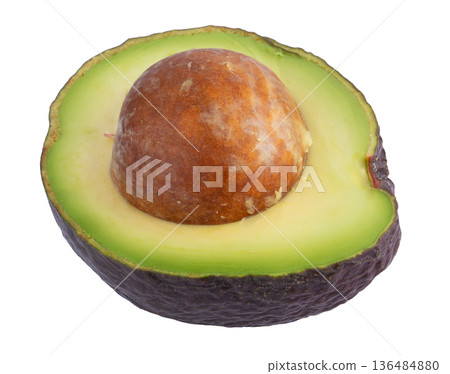 Avocado and Half of fresh avocado with kernel isolated on a white background. 136484880
