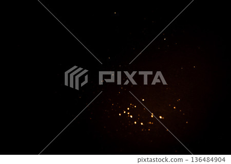 Golden abstract bokeh on black background. Holiday concept Golden abstract bokeh on black background. Holiday concept 136484904