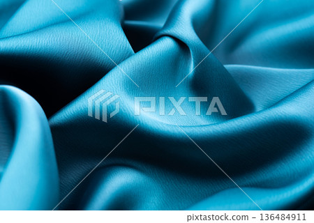 Turquoise satin texture with elegant waves Turquoise satin texture with elegant waves 136484911