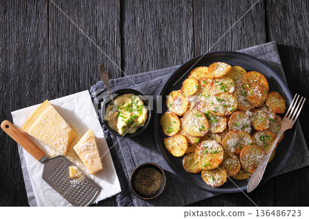 Roasted Potato Slices with Parmesan Cheese Top View 136486723