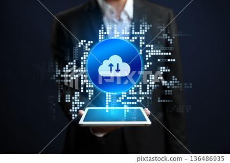 Cloud storage technology is shown on a tablet in a business setting Cloud storage technology is shown on a tablet in a business setting 136486935