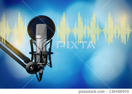 Podcast setup with microphone and sound wave display for audio recording session 136486950