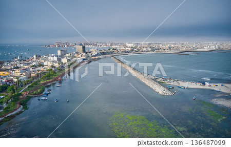 Aerial view revealing la punta district and callao port Aerial view revealing la punta district and callao port 136487099