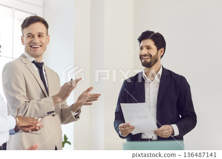 Smiling confident business leader, mature businessman professional executive manager celebrating Smiling confident business leader, mature businessman professional executive manager celebrating 136487141