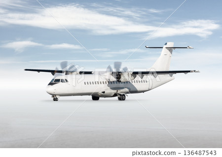 White passenger turboprop plane isolated on bright background with sky White passenger turboprop plane isolated on bright background with sky 136487543