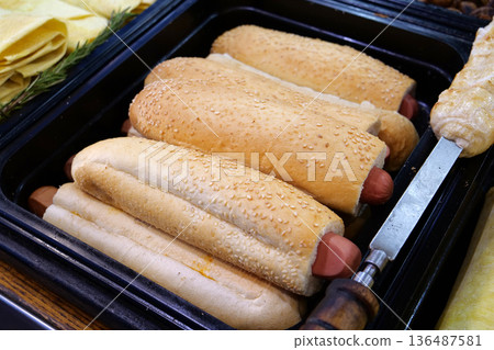 Hot dogs. Sausage in dough. Foods in street fast food restaurant 136487581