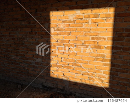 The rays of the setting sun passed through the square window 136487654