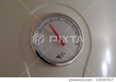 Water heater thermometer. Water in boiler is cold, boiler must heat the water 136487657