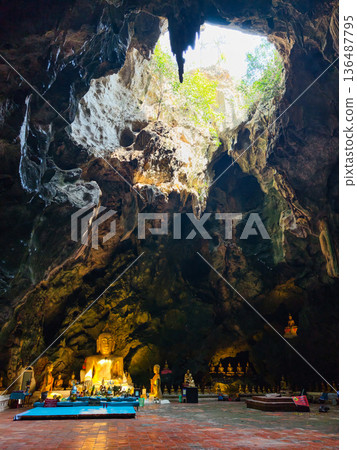 Thailand, Phetchaburi-FEB 10, 2026-Khao Luang cave is a natural cave famous for its beauty and sacredness. There are full of Buddha Images. 136487795