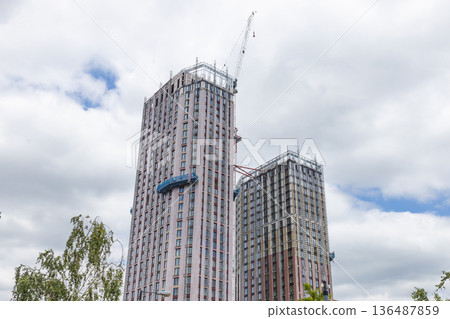 Construction site with tall residential towers Construction site with tall residential towers 136487859