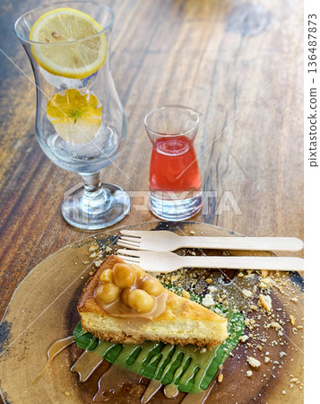 Macadamia cheese cake and juice Macadamia cheese cake and juice 136487873