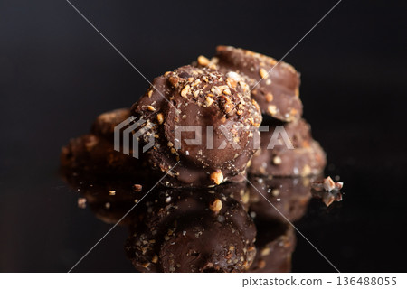 Crunchy Chocolate Snacks With Nuts, Coated In Tasty Chocolate Crunchy Chocolate Snacks With Nuts, Coated In Tasty Chocolate 136488055
