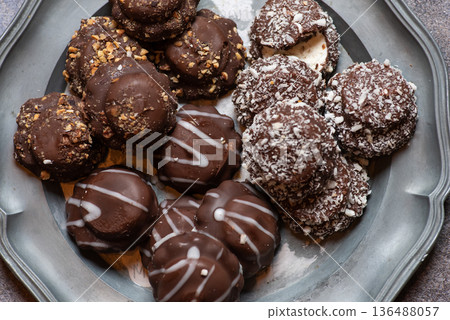 Assorted Chocolates On A Silver Platter, Irresistible Delicacies Assorted Chocolates On A Silver Platter, Irresistible Delicacies 136488057