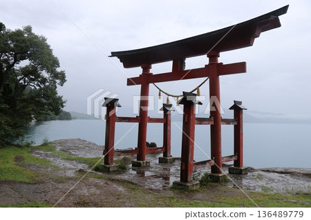 Gozanoishi Shrine on the shores of Lake Tazawa on a rainy day, Akita Prefecture, Tohoku 136489779