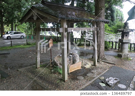 Gozanoishi Shrine on the shores of Lake Tazawa on a rainy day, Akita Prefecture, Tohoku 136489797