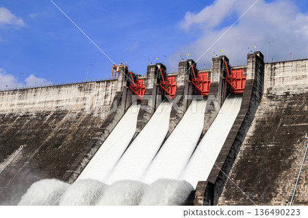 Water spill from spillway of Khun Dan Prakan Chon Dam. The biggest Roller compacted concrete dam, Nakhon Nayok thailand. Water spill from spillway of Khun Dan Prakan Chon Dam. The biggest Roller compacted concrete dam, Nakhon Nayok thailand. 136490223