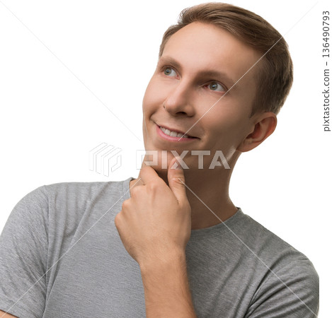 Thoughtful young man contemplating ideas during a creative moment indoors 136490793