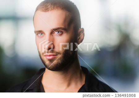 Hispanic Young man portrait looking directly at camera Hispanic Young man portrait looking directly at camera 136491008