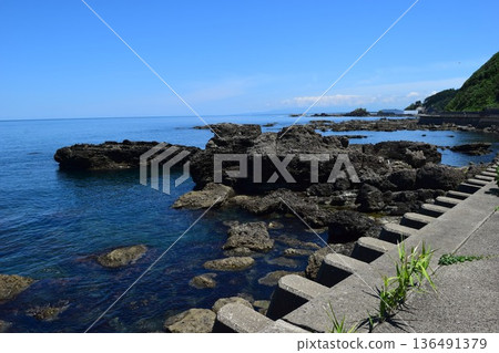 The rocky landscape of the Shonai coast where rocky shores of strangely shaped rocks continue The rocky landscape of the Shonai coast where rocky shores of strangely shaped rocks continue 136491379