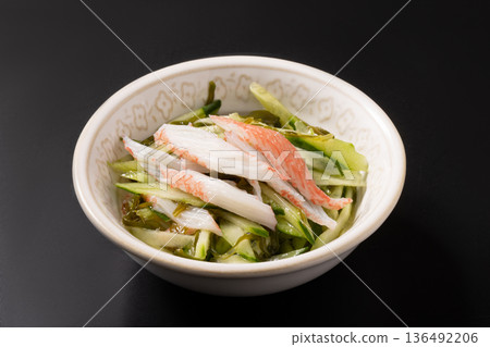 Vinegared dish (mekabu seaweed, cucumber, crab sticks) 136492206