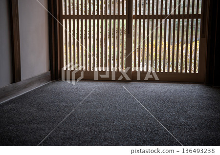 Lattice door and dirt floor Lattice door and dirt floor 136493238