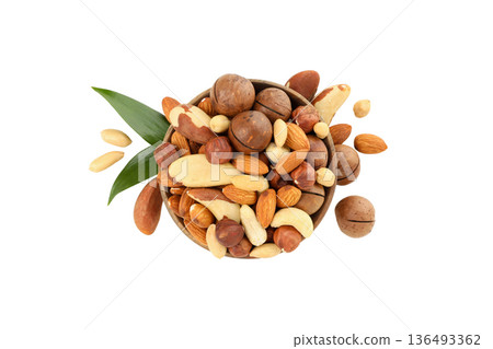 Nuts are arranged in a bowl with green leaves around, PNG Nuts are arranged in a bowl with green leaves around, PNG 136493362