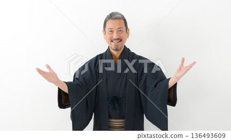 A man wearing a kimono A man wearing a kimono 136493609