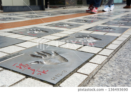 Celebrity handprint sidewalk art 136493690
