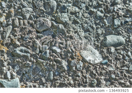Unpaved road texture with rugged stone texture Unpaved road texture with rugged stone texture 136493925