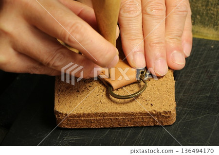 Make a leather craft keychain Make a leather craft keychain 136494170
