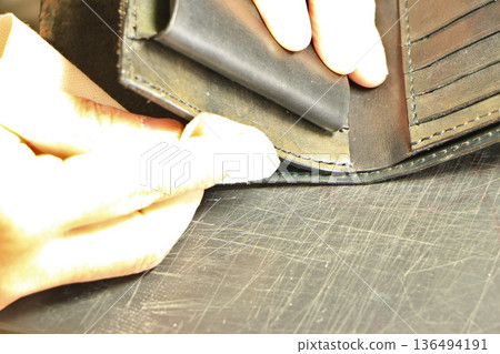 Repairing a wallet with leather craft Repairing a wallet with leather craft 136494191