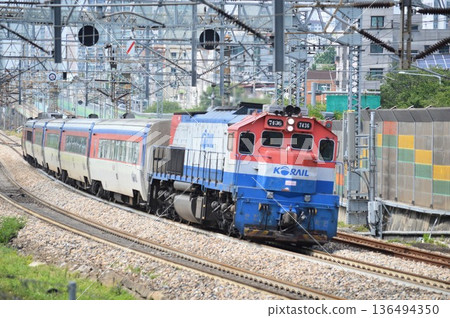 KORAIL Mugunghwa train running KORAIL Mugunghwa train running 136494350