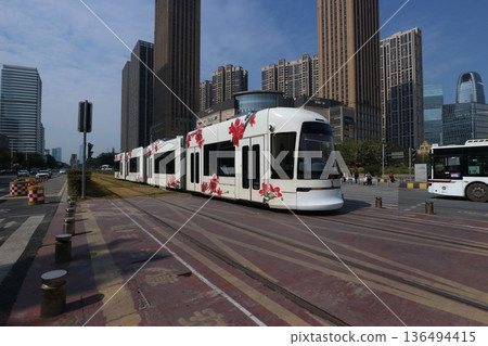 Buildings and trams in Guangzhou Buildings and trams in Guangzhou 136494415
