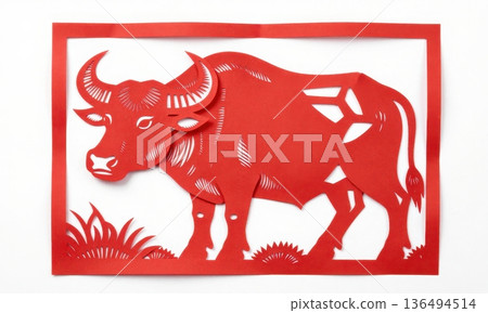 Traditional Chinese Red Paper Cut Art of Majestic Zodiac Ox with Horns and Grass. 136494514