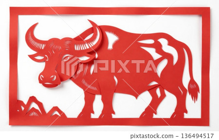 Traditional Chinese Red Paper Cut Art of Majestic Zodiac Ox with Horns and Grass. 136494517