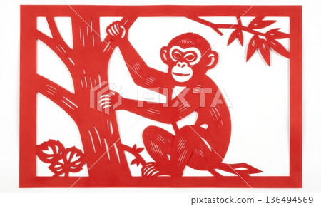 Traditional Chinese Red Paper Cut Art of Zodiac Monkey Climbing Tree. 136494569